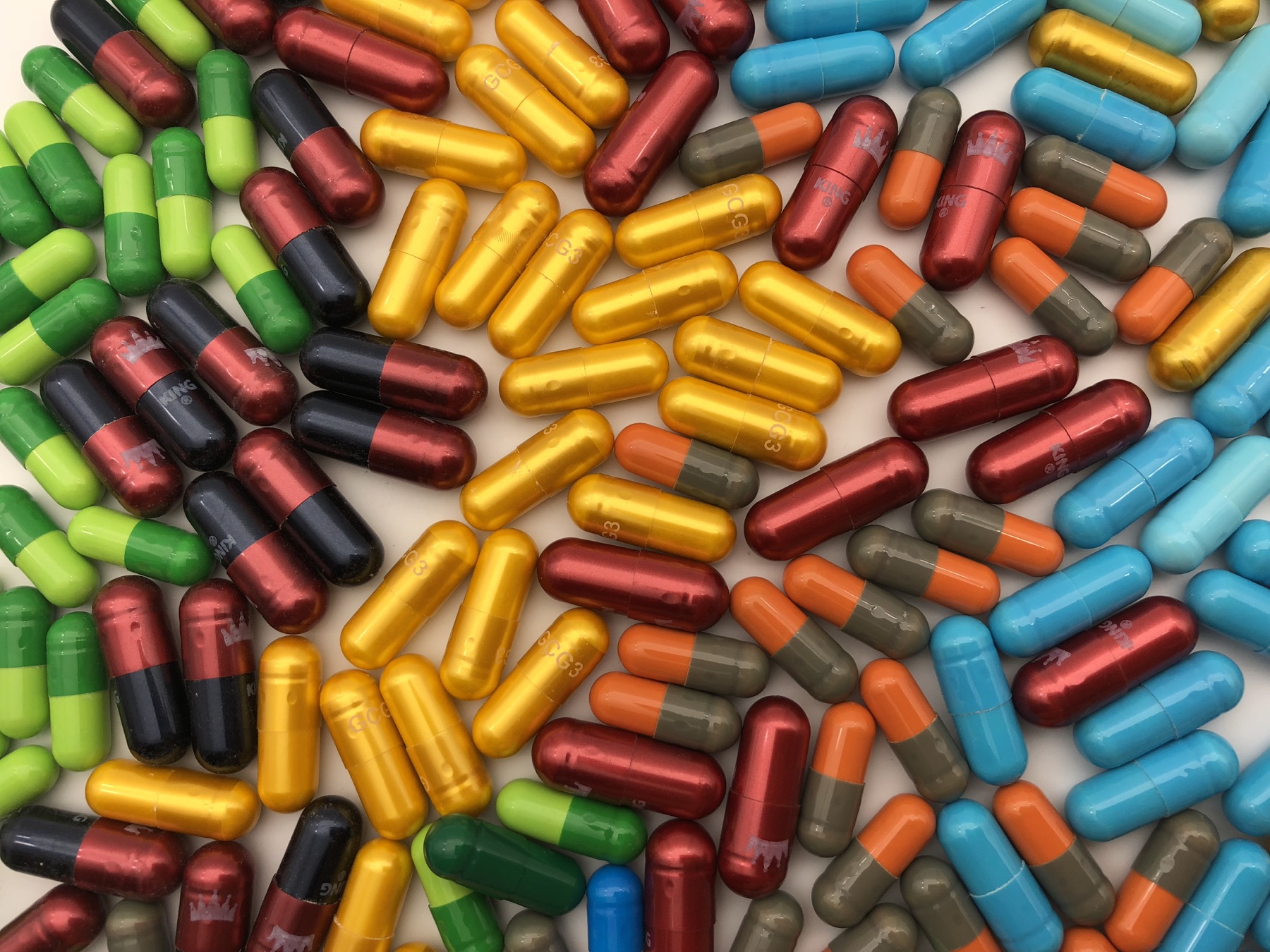 Custom colored supplement capsules